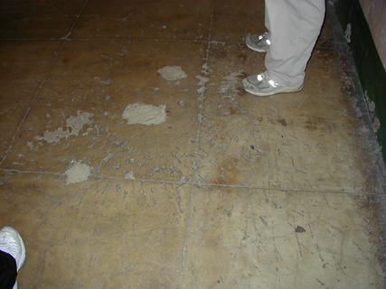 Explosion marks on the floor.  Caused by the military dropping explosives into the cell block to try and end an escape attempt<br>Location: <a href="https://www.google.com/maps/search/?api=1&query=37.8267,-122.42288" target="_new">Alcatraz Island</a>